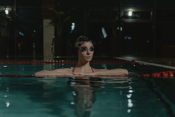 Swimmer wearing swim goggles during pool training
