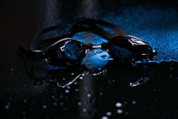 Swimming goggles on a towel after lens cleaning