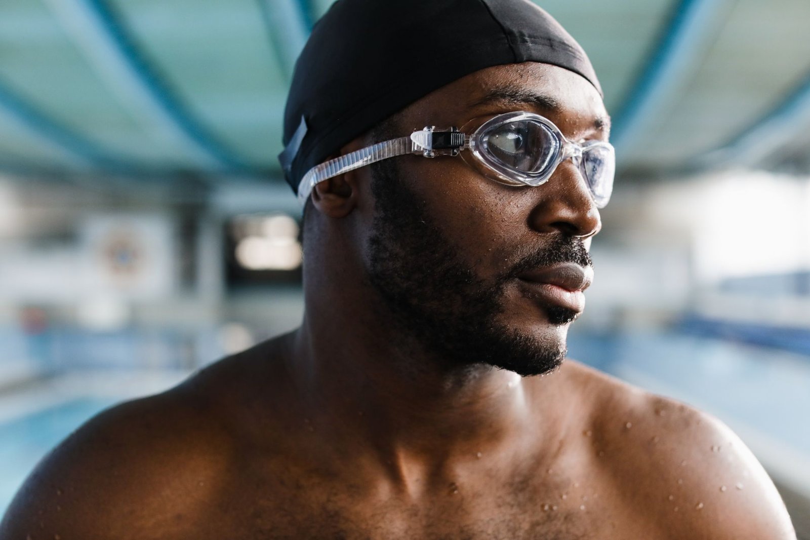 Swimmer wearing goggles before a pool session
